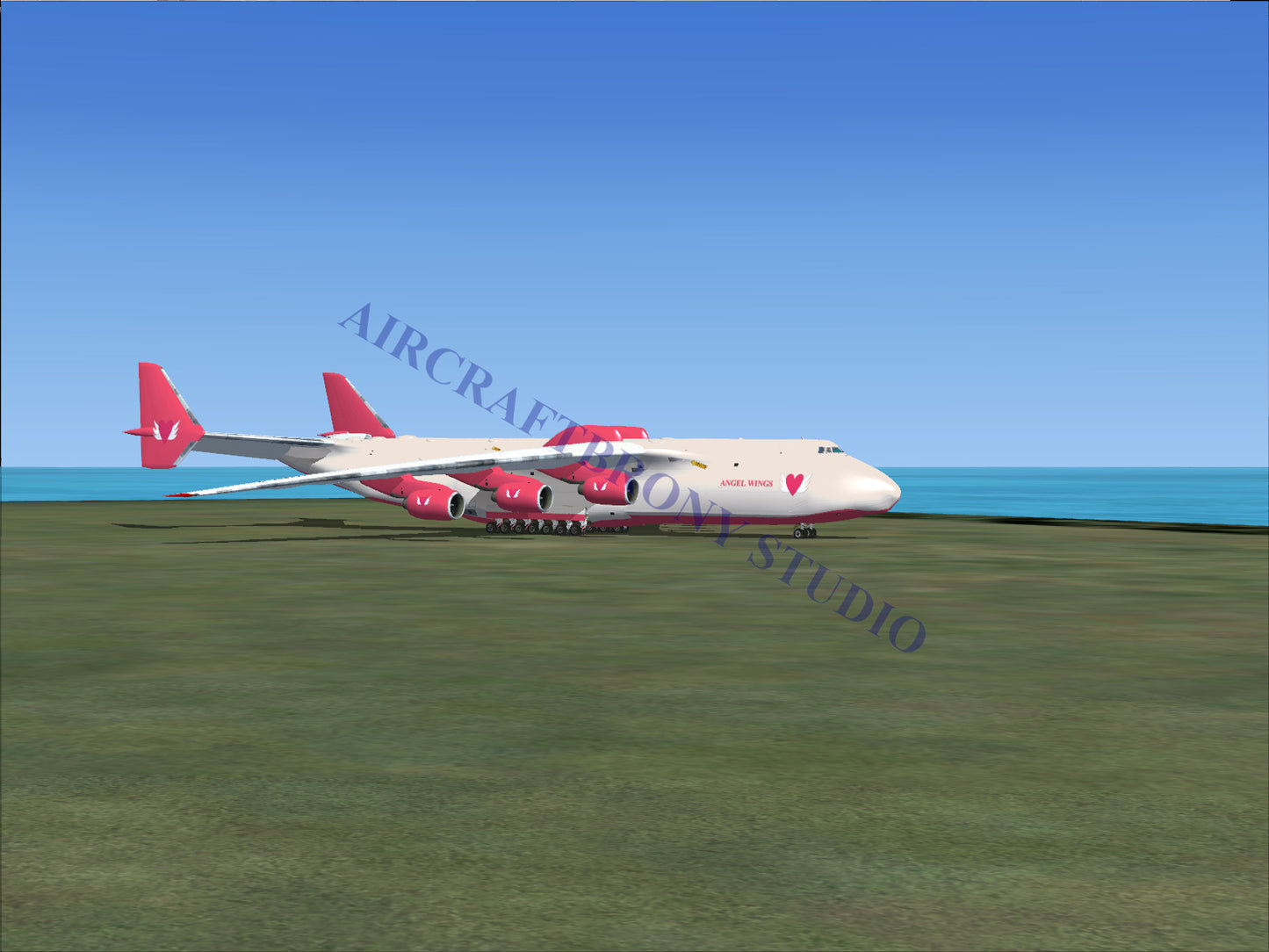 Red and white cargo plane with heart design on tail