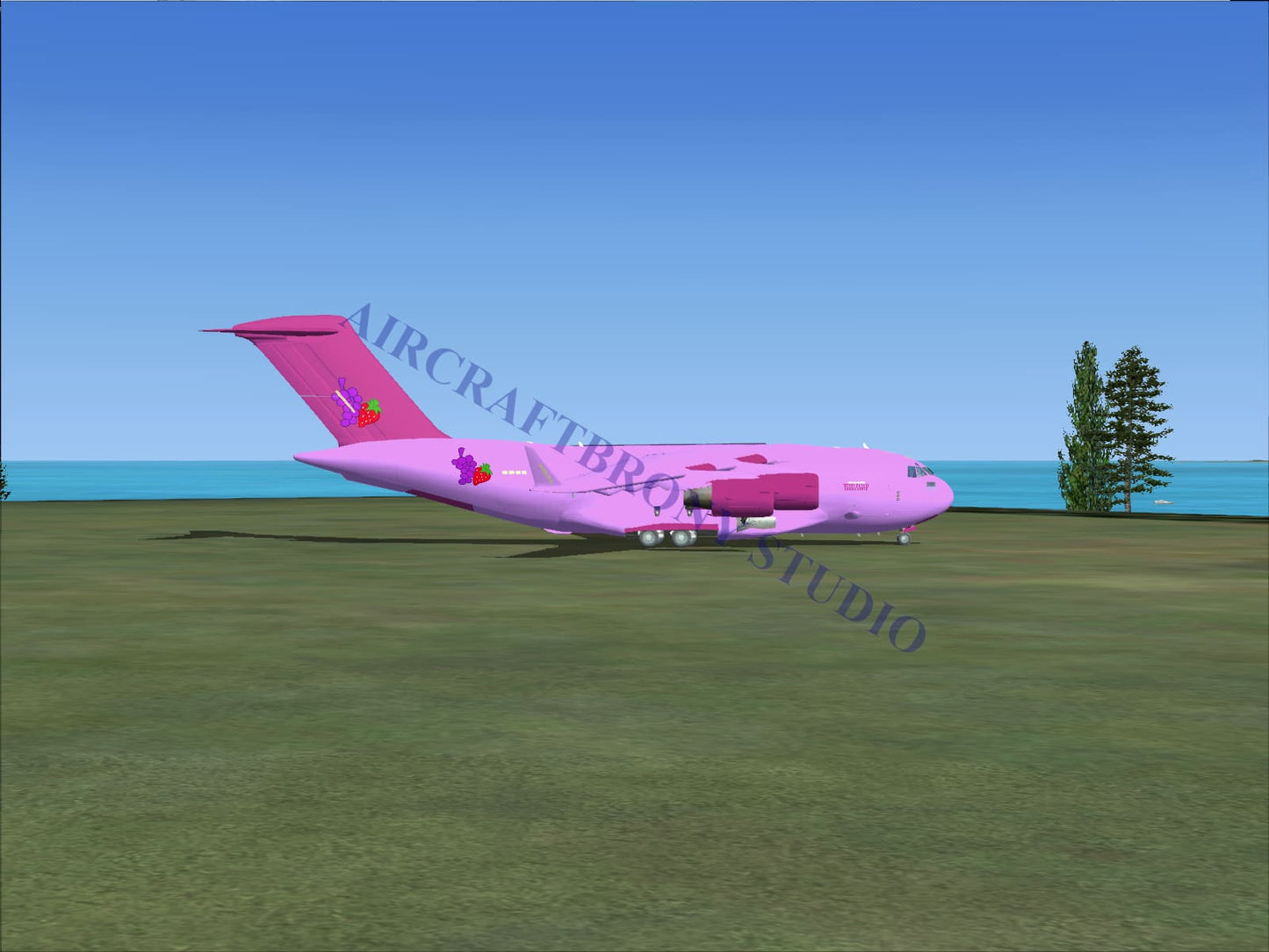 A vibrant pink berry punch boeing c-17 aircraft with a glossy finish and playful strawberry decals on its fuselage