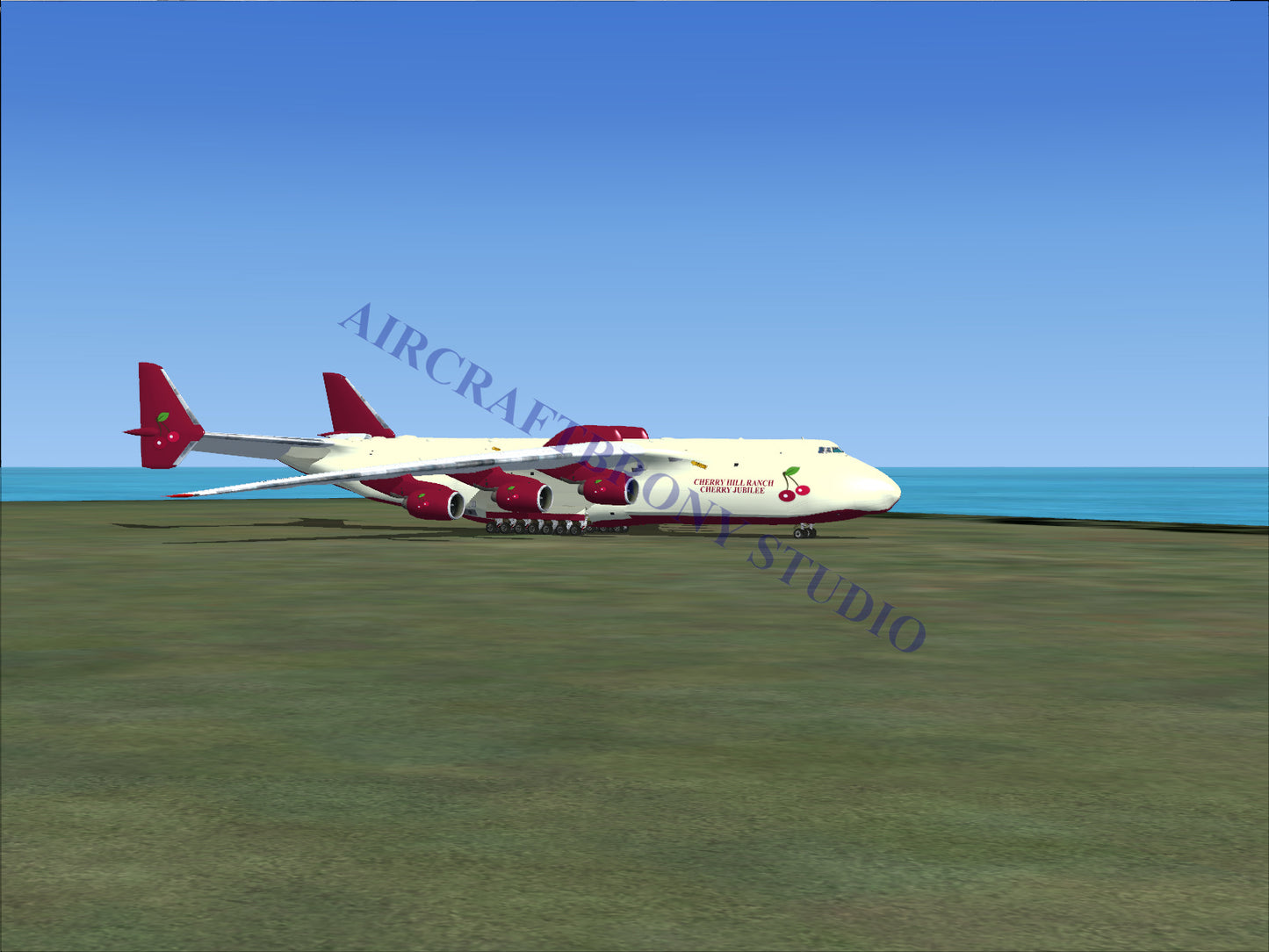Red and white cargo plane with large wheels, designed for heavy-lift operations.