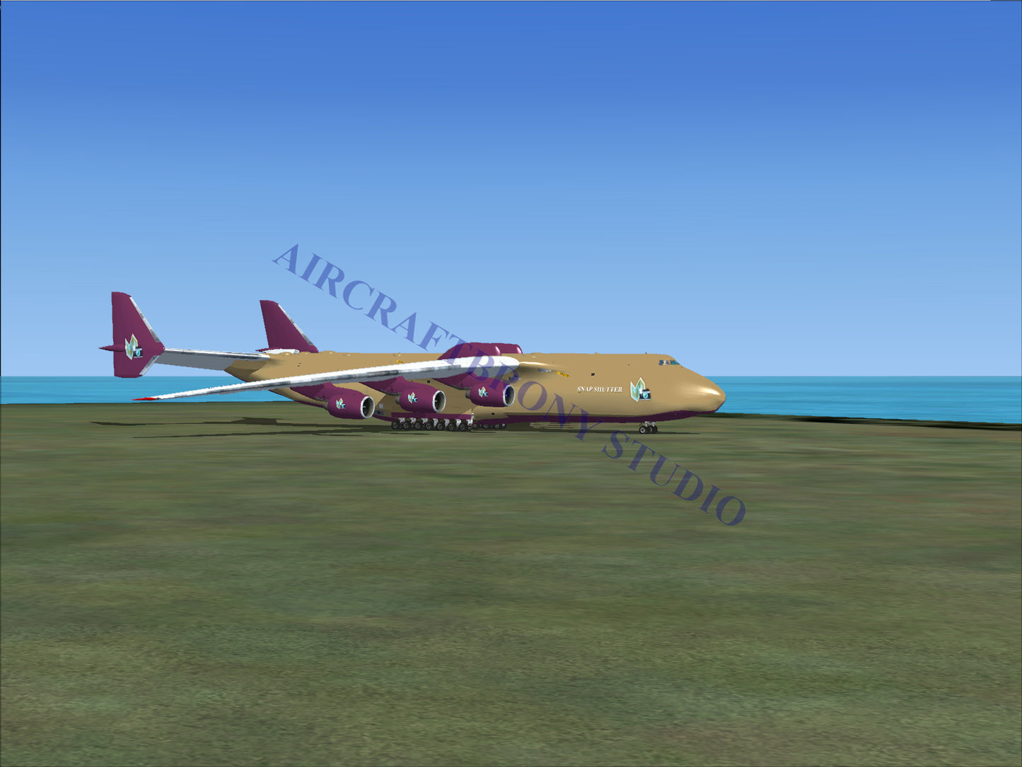 A beige cargo aircraft with maroon accents.
