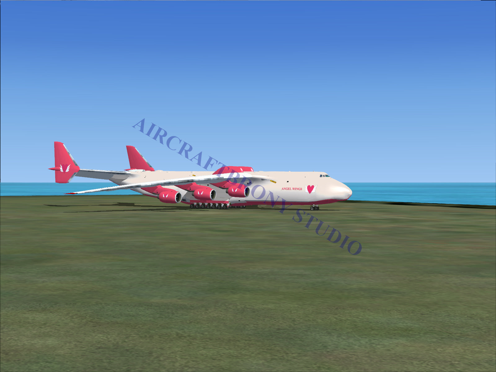 Red and white cargo plane with heart design on tail