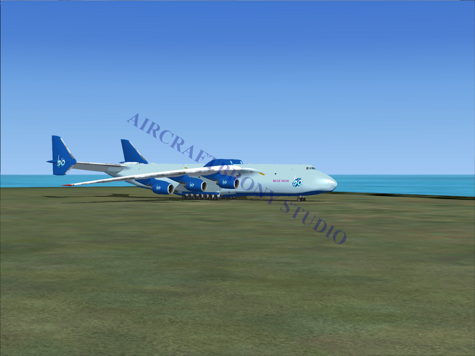Blue and white cargo plane with four engines, large windows, and a sleek design.