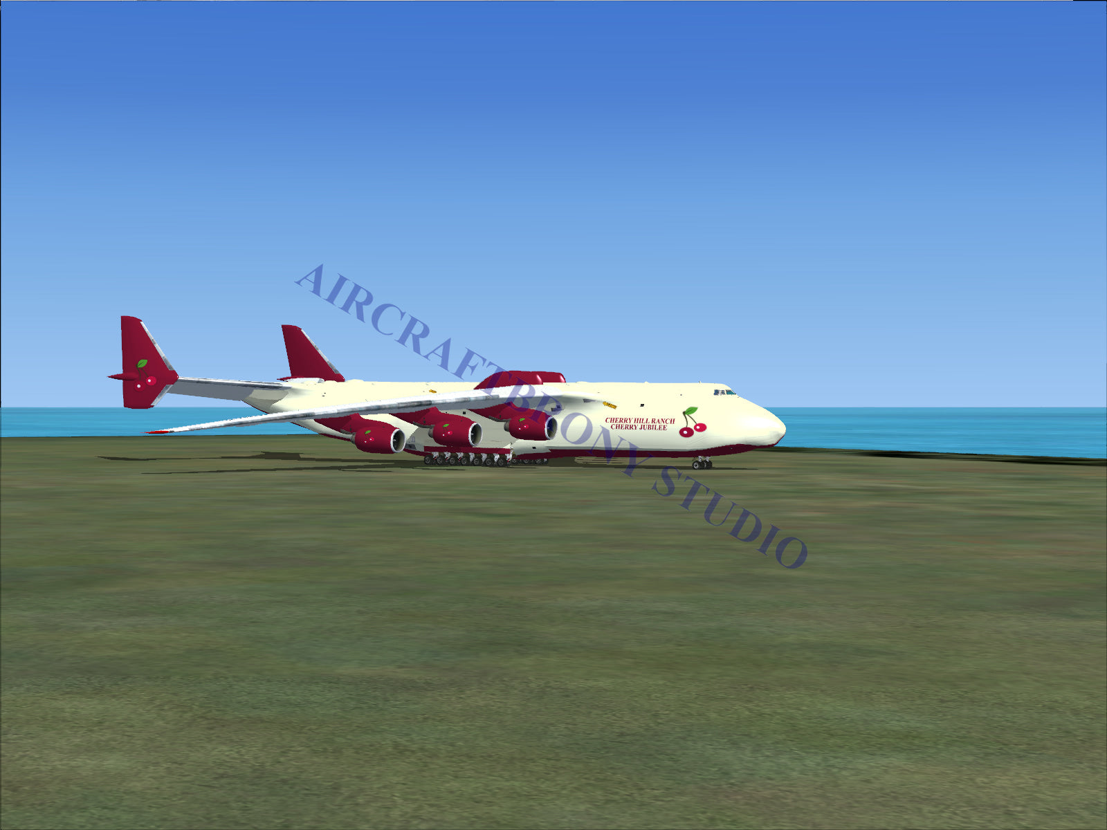 Red and white cargo plane with large wheels, designed for heavy-lift operations.