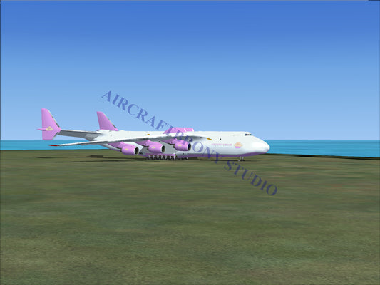 Pink and white cargo plane with large wings
