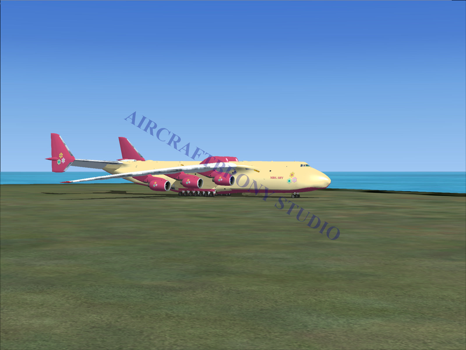 Yellow and red cargo plane with four engines, designed for heavy-lift transportation.