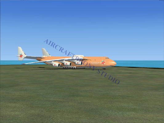 Orange antonov an-225 mriya cargo plane with four engines and a distinctive star logo.