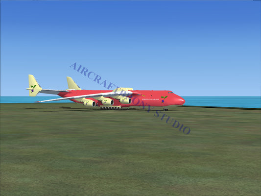 Red cargo aircraft with yellow wings and tail.