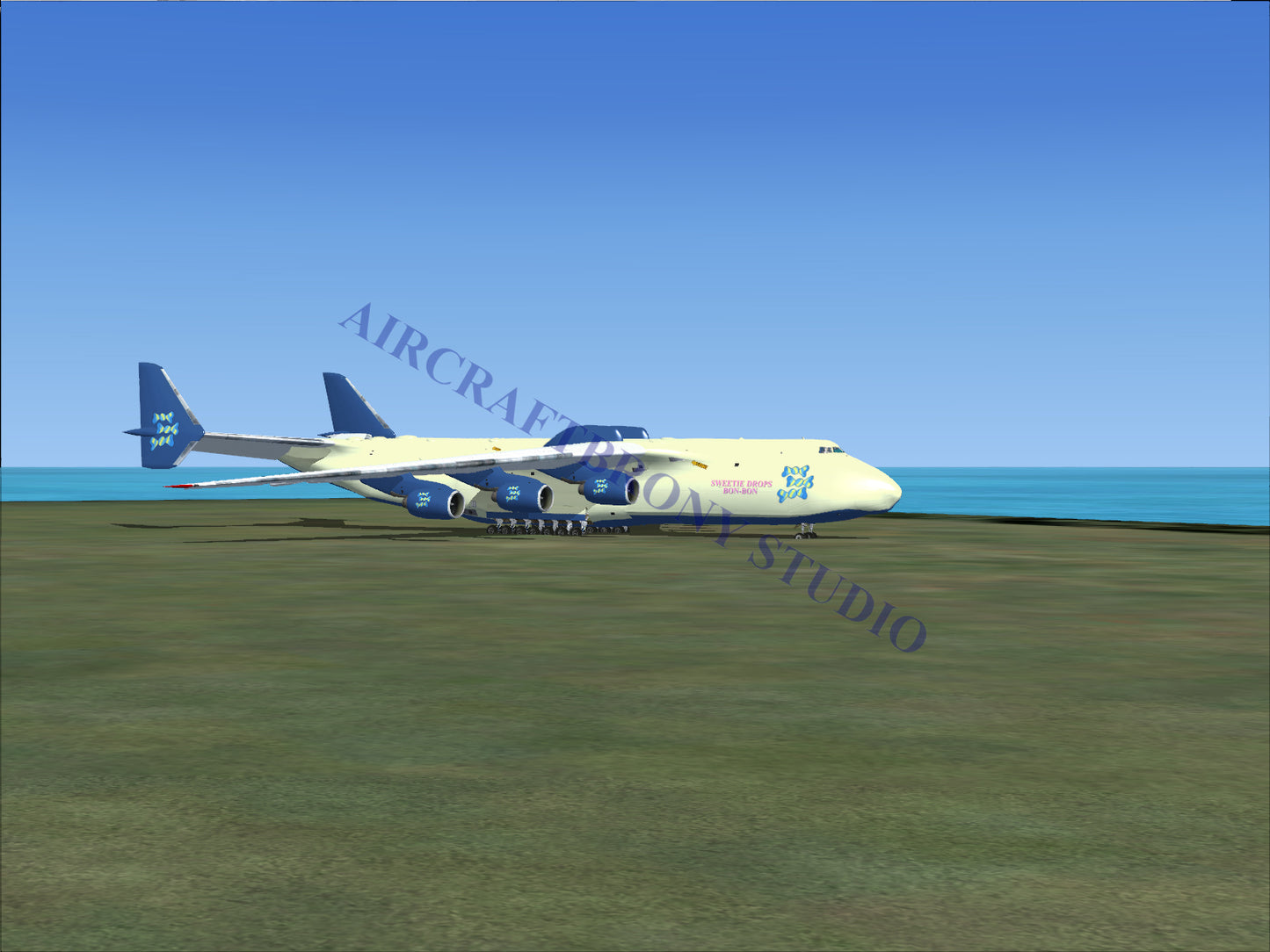 Blue and white cargo plane with large wheels, designed for heavy loads.