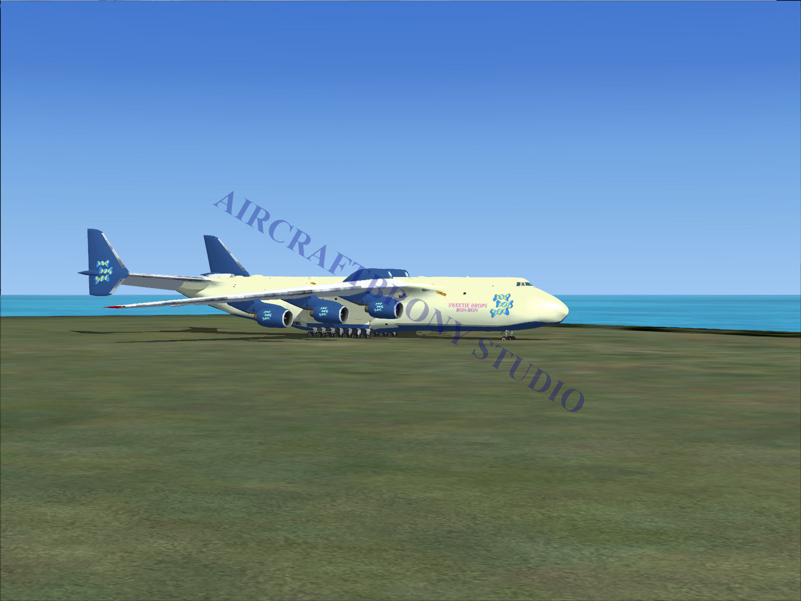 Blue and white cargo plane with large wheels, designed for heavy loads.